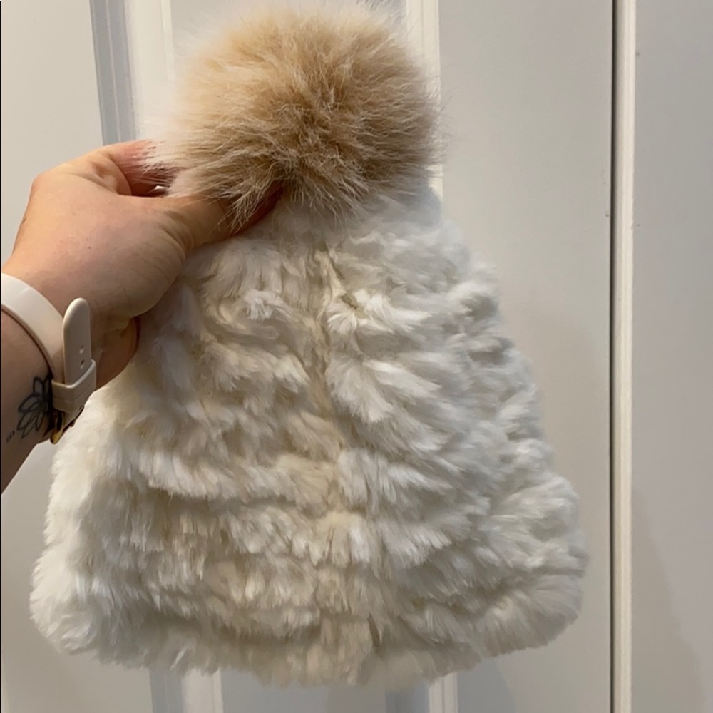 White faux fur hat